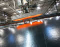 Bonding: The adhesive is activated by heat. A vacuum compresses the membrane