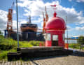 The dome of the Moleturm lies in the harbour in preparation for reconstruction.