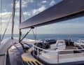 There are two steering wheels on the raised flybridge.