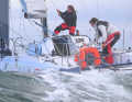 Qualification winners Elodie Bonafous and Basile Bourgnon have their hands full in powerful winds