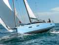 The best of both worlds: Full bow, wide stern, negative deck leap, ample sail area - and a surprising amount of comfort below deck