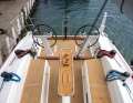 Six winches, traveller, backstay. That's all you need, and there's plenty of room for the crew