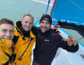 The team was only able to join their skipper on board in the morning after crossing the finish line at night.