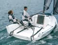 Tidy and uncluttered. You sit sideways on the deck, the cockpit offers plenty of space. The First has a twin rudder.