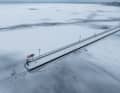 The pier at the city harbour on the Müritz is completely encased in ice.