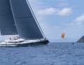 Up close and personal: a kite-foiler demonstrates the true size of "Red Dragon" (52 metres). The Alloy-Slup was the clear winner in its group, with the owner-steersman receiving the prize for best owner driver