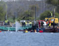 The stranded humpback whale Timmi has reached the transport barge. After helpers had secured the animal with straps, it was manoeuvred through a dredged channel directly into the barge. | Philip Dulian