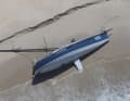 Die 12-Meter Yacht "Huntress" wurde nach einem Ruderbruch am Christmas Beach auf Cape Barren Island angespült