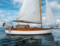 The silhouette of the "Gertrud III" is dominated by the deckhouse, jib boom and canoe stern