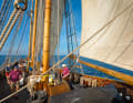 View from the foredeck aft of the boom jib, schooner, mainsail and mizzen