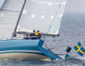 The striking aft chine is striking. Despite the width and the flat bulkhead aft, the design manages with just one rudder blade