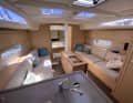 Saloon benches set as far out as possible, plenty of natural light, double doors to the foredeck - this is how Dufour accommodates a lot of volume in the hull, which is only 33 feet long