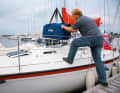 With the halyard as a crane, the dinghy is easy to get on board