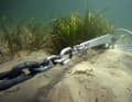 When anchoring for several days in tidal waters, the boat often turns round the anchor. The swivel prevents the chain from becoming taut
