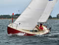 In regattas, this IF boat is sailed without a guard rail. On holiday she is put on it