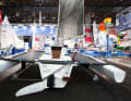 The rudder and centreboard are retractable, the hulls are pushed onto the beams on the hull for trailering