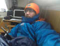 The single-handed sailor visibly exhausted below deck