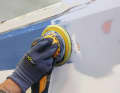 After chemical cleaning to remove waxes or oils, the surface is sanded with 150 grit sandpaper