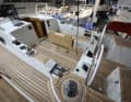 The sheets run on large Andersen winches close to the two wheels