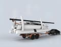 Roadworthy. With the floats folded in, the Corsair 880 can be easily transported on the trailer. The mast can be positioned and laid on the trailer using a jib device