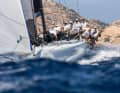 Dario Ferrari's Maxi 72 Cannonball leads down the seaward side of La Maddalena