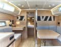 The interior can be finished in light oak, mahogany is standard