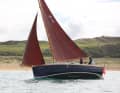 If you look closely, you can see one of the two stub keels on GRP, which give the boat lateral support when falling dry