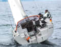 The asymmetrical companionway provides better ventilation for the galley on the port side