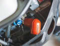 The spark plug connector is often brightly coloured to make it easier to identify. Replace porous rubber grommets to prevent leakage currents and faults