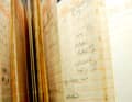 The yellowed pages of an old logbook. It is even compulsory to keep the document for three years