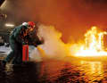Firefighting with a fire extinguisher can be practised at safety training courses. This allows you to familiarise yourself with the hand movements and effective procedures.