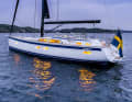 Inviting. The boat has many windows. The wide cockpit creates space for two helm stations