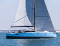 The JPK 39 Fast Cruiser is visually distinctive: flat freeboard, elongated superstructure, ample sail area