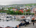 The harbour of Tórshavn. The "FreiKerl" is also moored at one of the jetties (grey aluminium yacht with red boom cover)