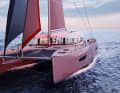 The cabin superstructure is mounted far aft. The hulls are long and slim at the front