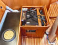 Faurby 370 starter and service battery rest in a central position under the sofa in the saloon