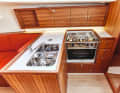 J 112 E The working height is low, which is tiring to work at. Lots of storage space, little surface area