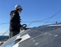 Controlled the start and the rounding of the buoys herself - from the companionway lying completely astern to windward