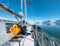 Picture-book weather in the far north. The "Qilak" glides calmly along against a breathtaking backdrop