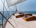 A sheer deck with flat, boxy superstructures and huge Dorade fans characterise the appearance of the "Scarabee"