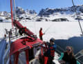 Mooring at the edge of the ice. In Greenland, the crew develops a special manoeuvre: bow into the ice, anchor out