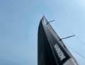 Mast as a reference: To capture the exact measurement, the mast should be in the picture. The width of the forestay profile helps to estimate the sag