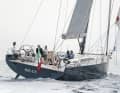 The running deck is not extended laterally to the rear. The helmsman sits far outboard