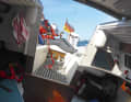 At sea: Dörges and his co-sailor take turns at the tiller