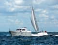 Without waves, the motorboat can play to its strengths and simply outrun the sailor
