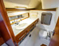 Low: the large wet room with oil locker. However, there is a lack of height above the WC