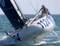 Tom Wehde races across the finish line of his first Mini Atlantique.