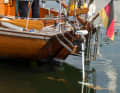 Electric whisk on an old wooden yacht
