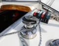 The latch stopper should be closed when staying and working in the mast to prevent unintentional release