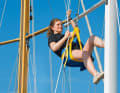 Terminals and spreaders: When the mast is upright, the only way to visually check the terminals and spreader bolts is to climb into the rigging